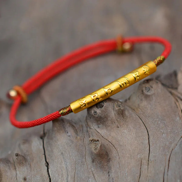 dalai lama gold red string bracelet